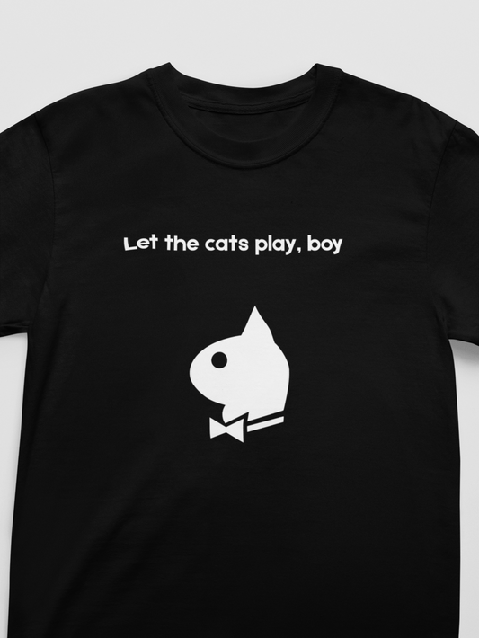Black t-shirt with white graphic and text 'Let the cats play, boy' on a light gray background